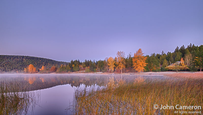Mist on St. Mary lake on a fall morning Mist on St. Mary lake on a fall morning